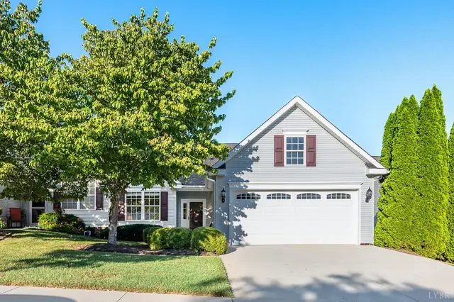 Front of the house with a two-car garage and a concrete driveway at 107 Bexley Drive, Lynchburg VA