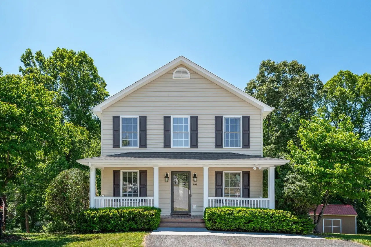 Front of the two-story house with a covered front porch at 109 Judd Court, Lynchburg VA