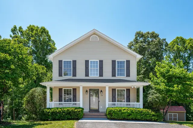 Front of the two-story house with a covered front porch at 109 Judd Court, Lynchburg VA