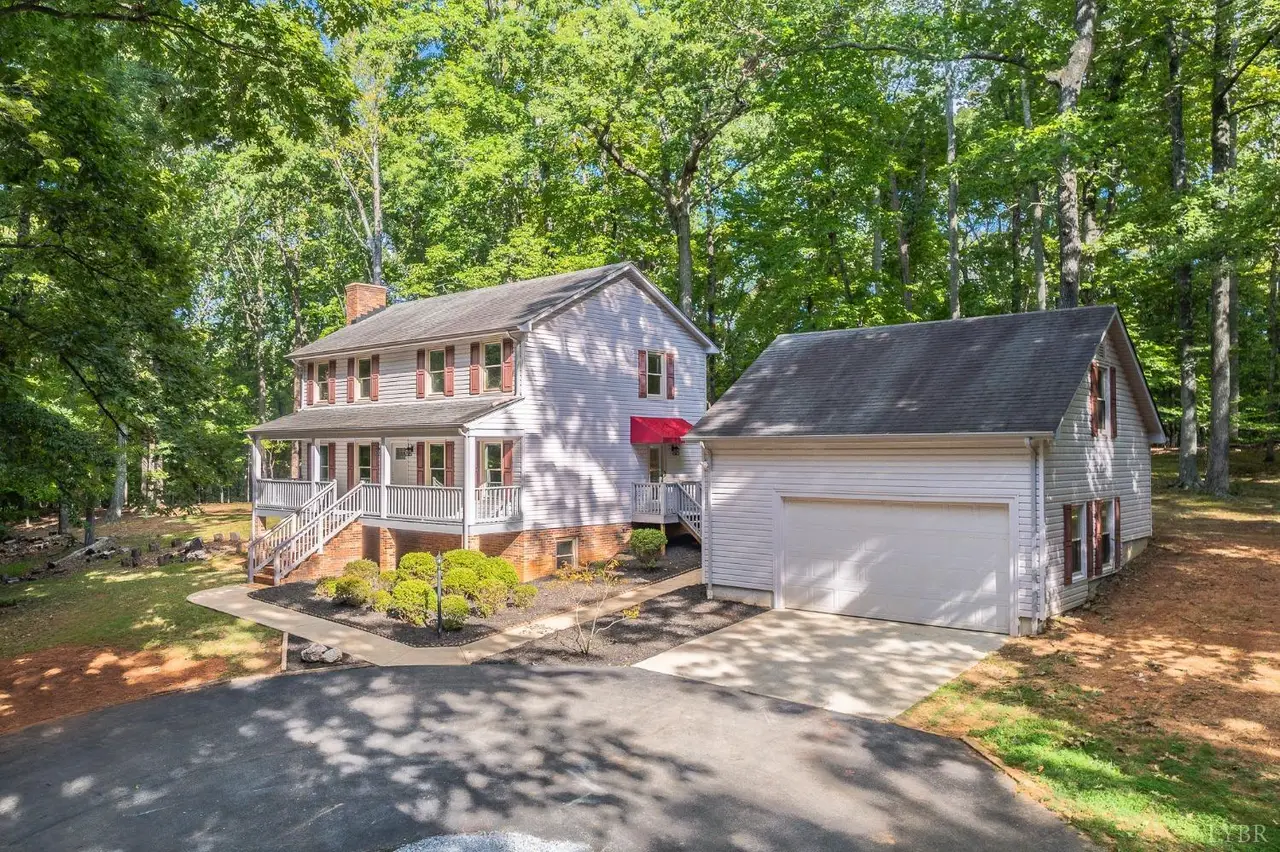 House with a detached garage and paved driveway at 1149 Fleming Mountain Drive, Lynchburg VA