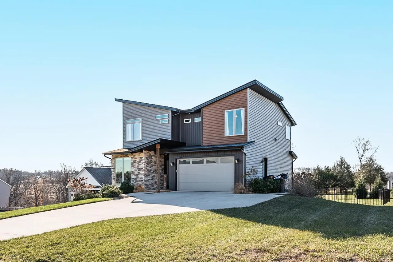 Front of the house, two-story modern with stone accents and a two-car garage at 1172 Jefferson Meadows Drive, Forest VA