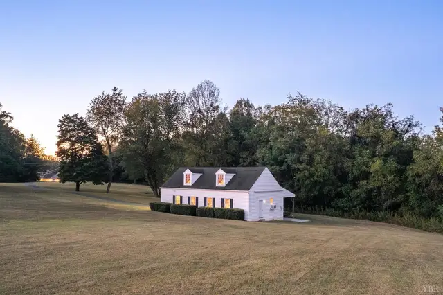 Outbuilding with dormers in an open field at 1351 Country Estates Drive, Lowry VA