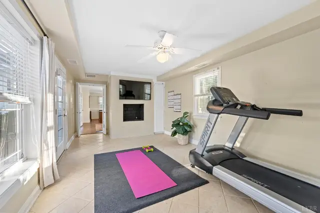 Exercise room with a treadmill and a doorway to the hall at 1351 Country Estates Drive, Lowry VA