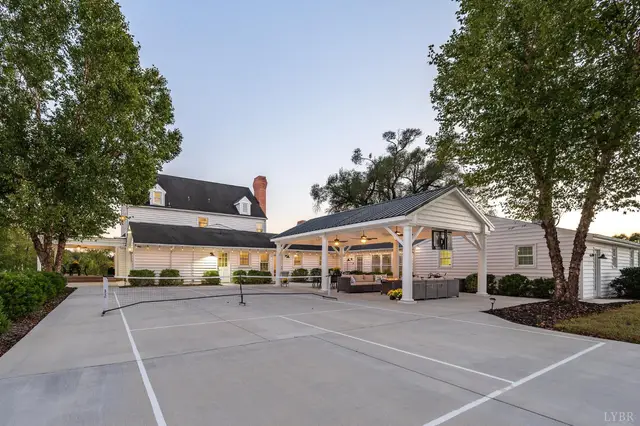 Sport court with a net beside the back of the house at 1351 Country Estates Drive, Lowry VA