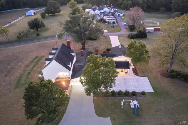 Aerial view of the driveway, sport court and detached garage at 1351 Country Estates Drive, Lowry VA
