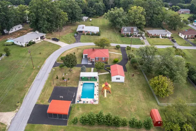 Aerial view of the property with a pool, detached garage and carport at 178 Brooklawn Drive, Lynchburg VA