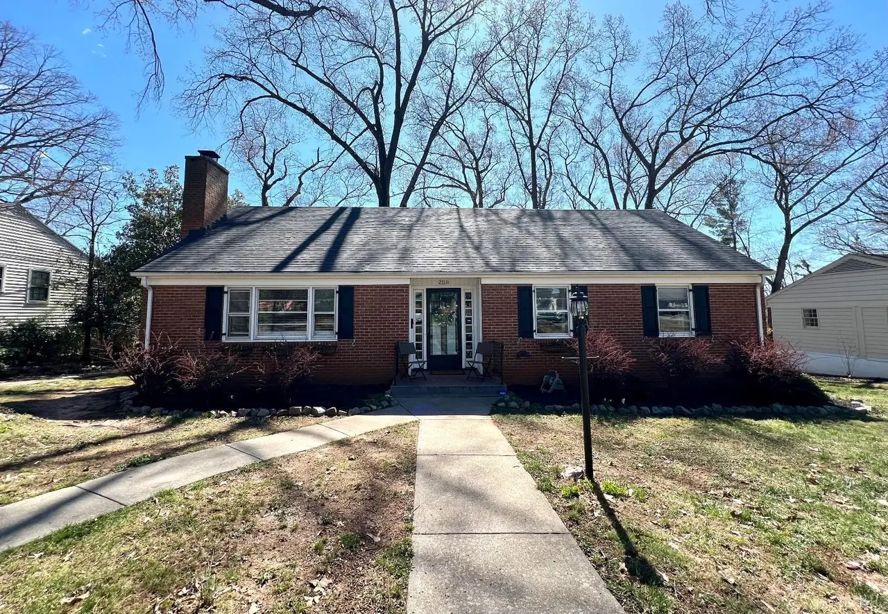 Front of the house, brick ranch with black shutters and a front walkway at 2118 Westerly Drive, Lynchburg VA