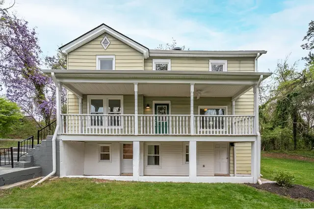 Front of the house, two-story with double covered porches at 223 7th Street, Madison Heights VA