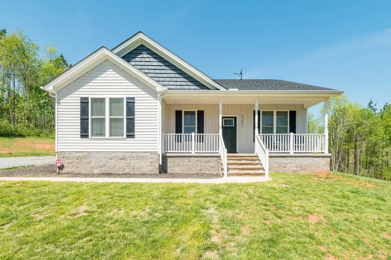 Front of the house, one-story with a covered front porch and white railings at 2292 Wheeler Road, Lynchburg VA