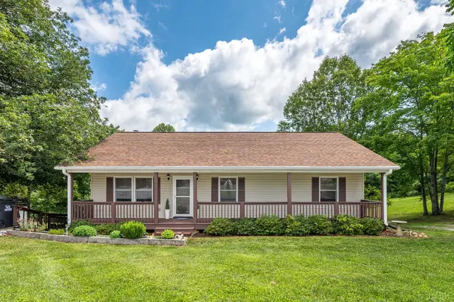 Front of the house, one-story with a covered porch and shrubs at 259 Crescent Lane, Monroe VA