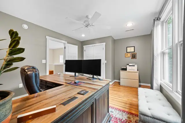 Office with an L-shaped desk and window bench at 2842 Chilton Road, Appomattox VA