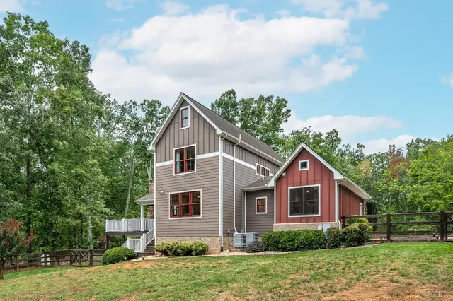 Back of the house with a fenced yard at 2842 Chilton Road, Appomattox VA
