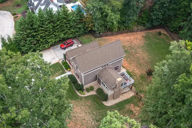 Aerial view of the house with a fenced backyard at 2842 Chilton Road, Appomattox VA