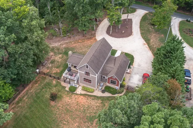 Aerial view of the house and a circular gravel driveway at 2842 Chilton Road, Appomattox VA