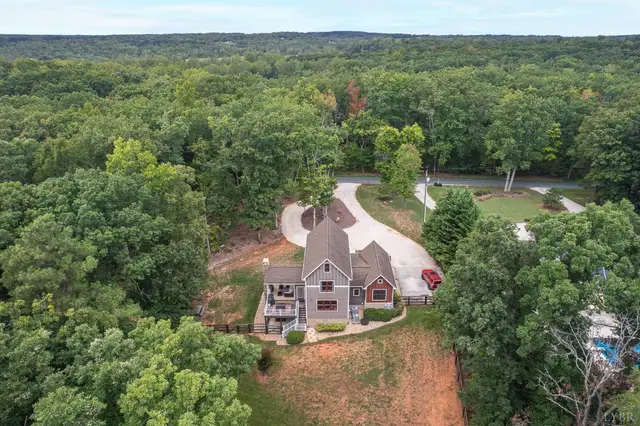 Aerial view of the house surrounded by woods at 2842 Chilton Road, Appomattox VA