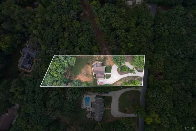 Aerial view with the lot outlined among trees at 2842 Chilton Road, Appomattox VA