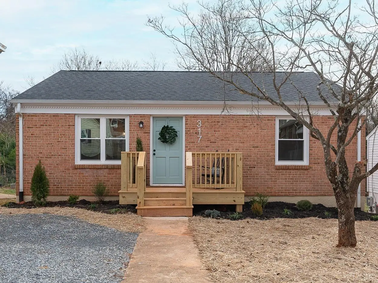 Front of the house, brick one-story with a wood front stoop at 317 Warren Avenue, Lynchburg VA