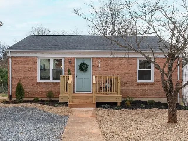 Front of the house, brick one-story with a wood front stoop at 317 Warren Avenue, Lynchburg VA