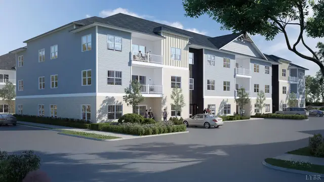 Exterior rendering of the three-story condo building and parking lot at 419 Rotunda Street 3007, Lynchburg VA