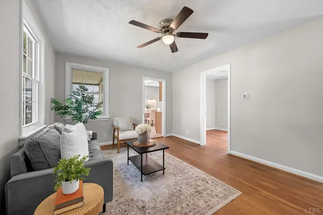 Living room with hardwood floors and a ceiling fan at 4525 Brooklawn Circle, Lynchburg VA