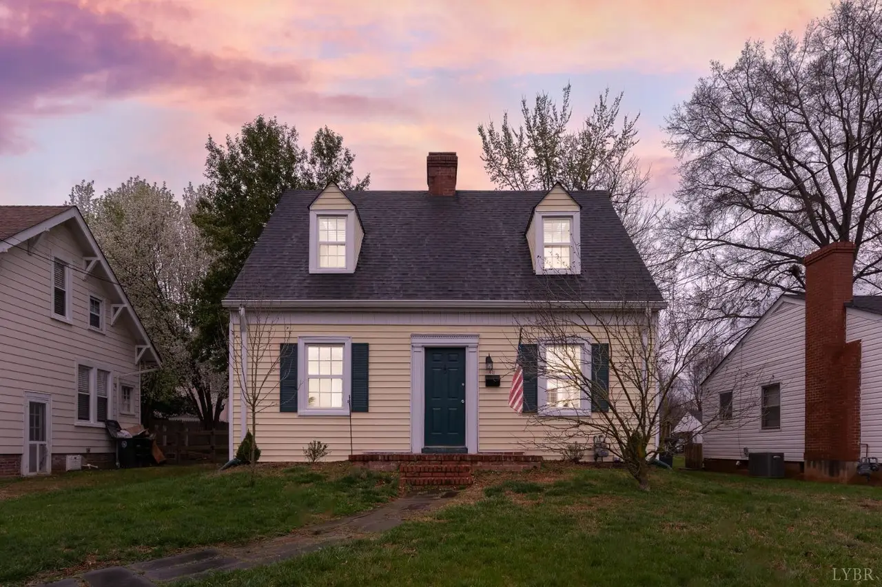Front of the house with two dormers at sunset at 611 Riverside Drive, Lynchburg VA