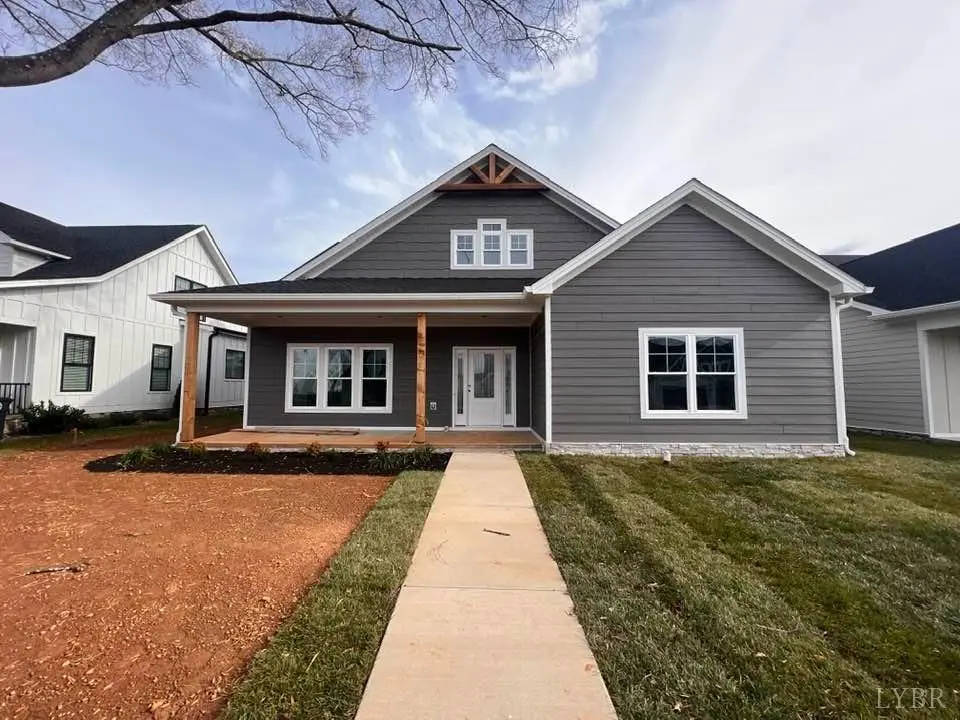 Front of the gray house with a covered front porch and walkway at 710 Elmwood Avenue, Lynchburg VA