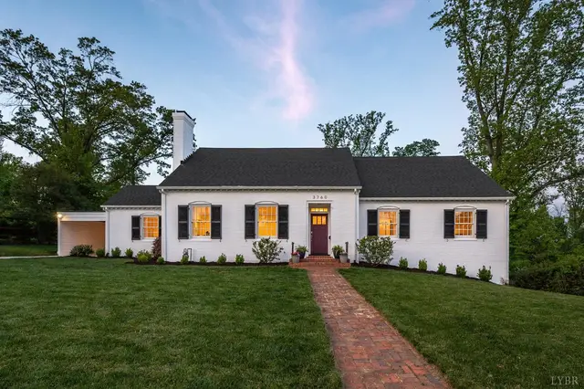 Front of the white brick house with a brick walkway at 3760 Woodside Avenue, Lynchburg VA