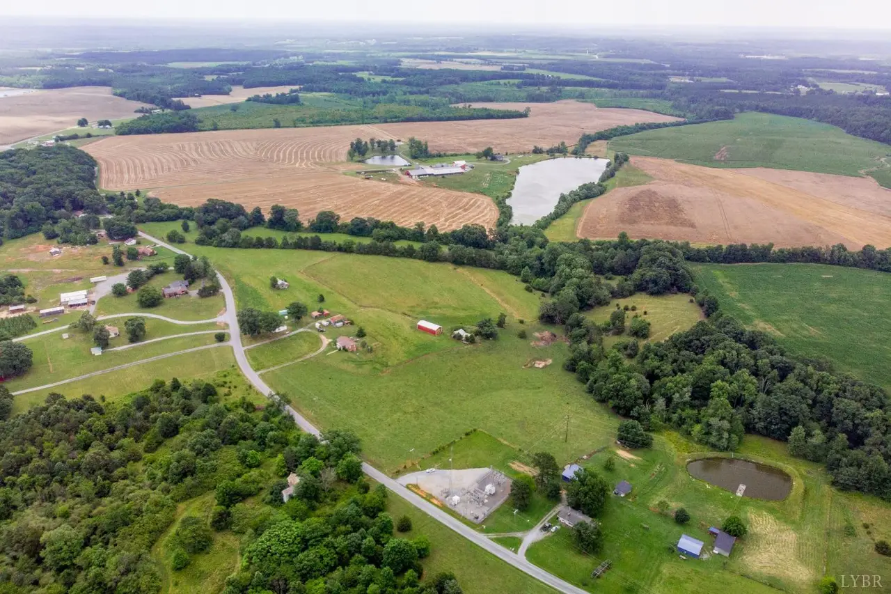 Aerial view of rolling farmland, fields and ponds at 989 Pigeon Run Road, Gladys VA